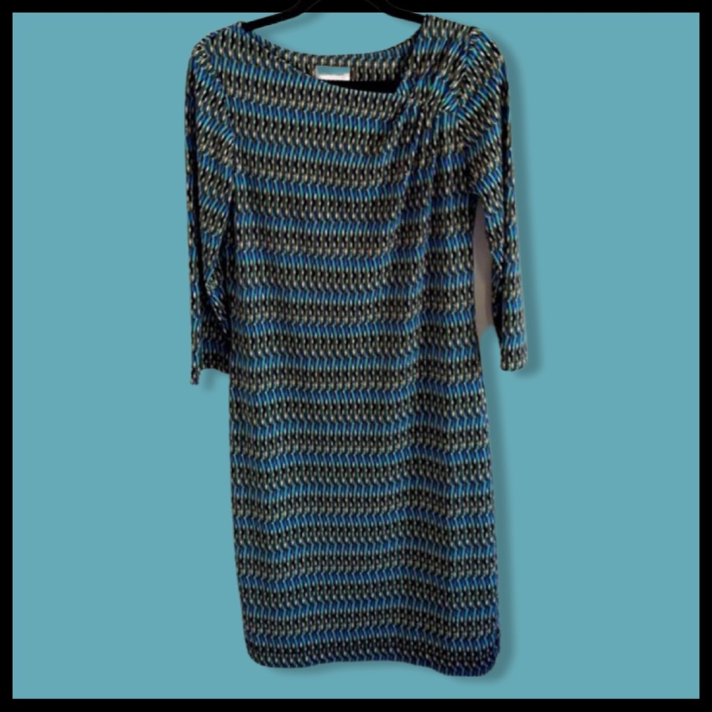 CALVIN KLEIN shift style dress with asymmetrical neckline.